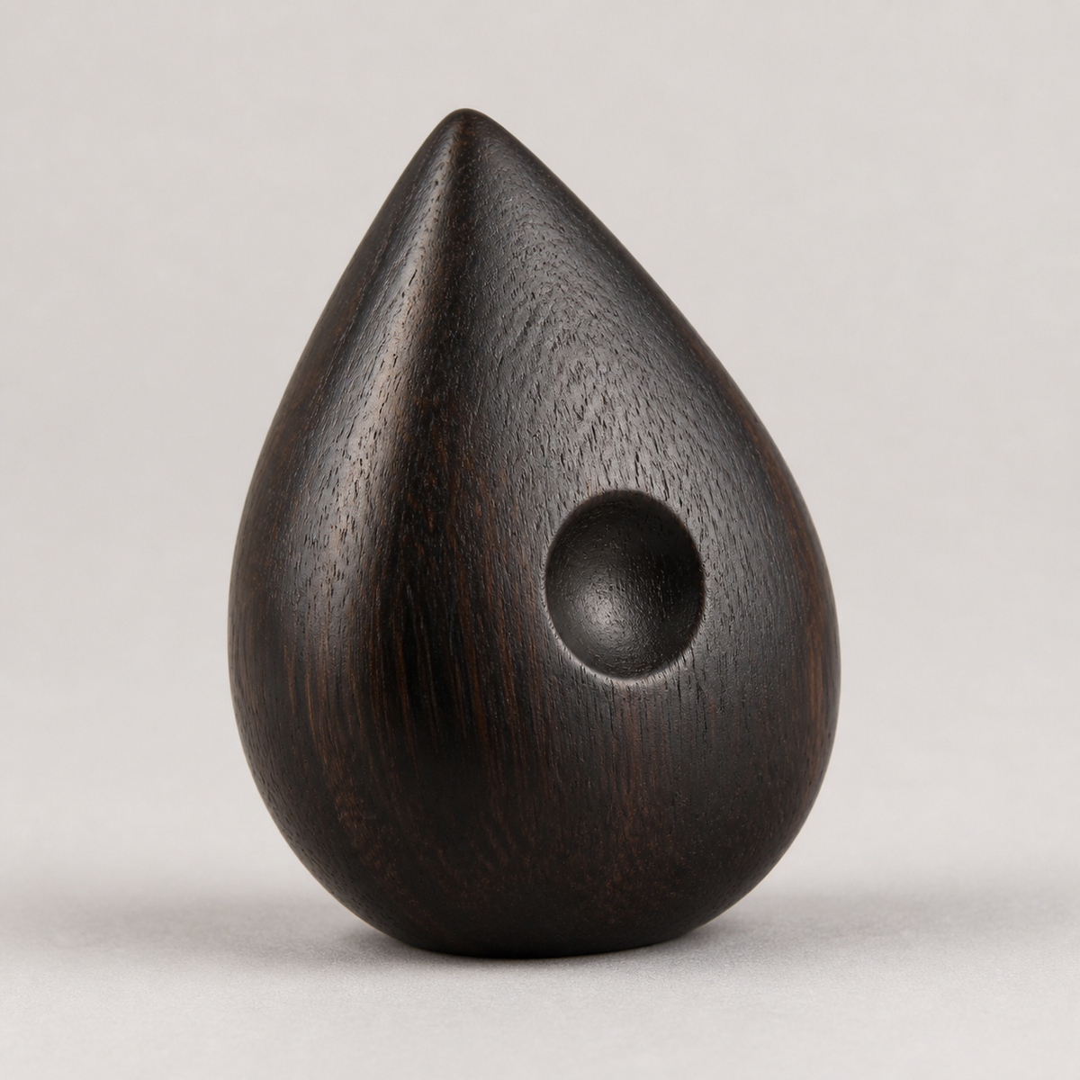 Quiet Seed, teak wood tabletop sculpture — product view