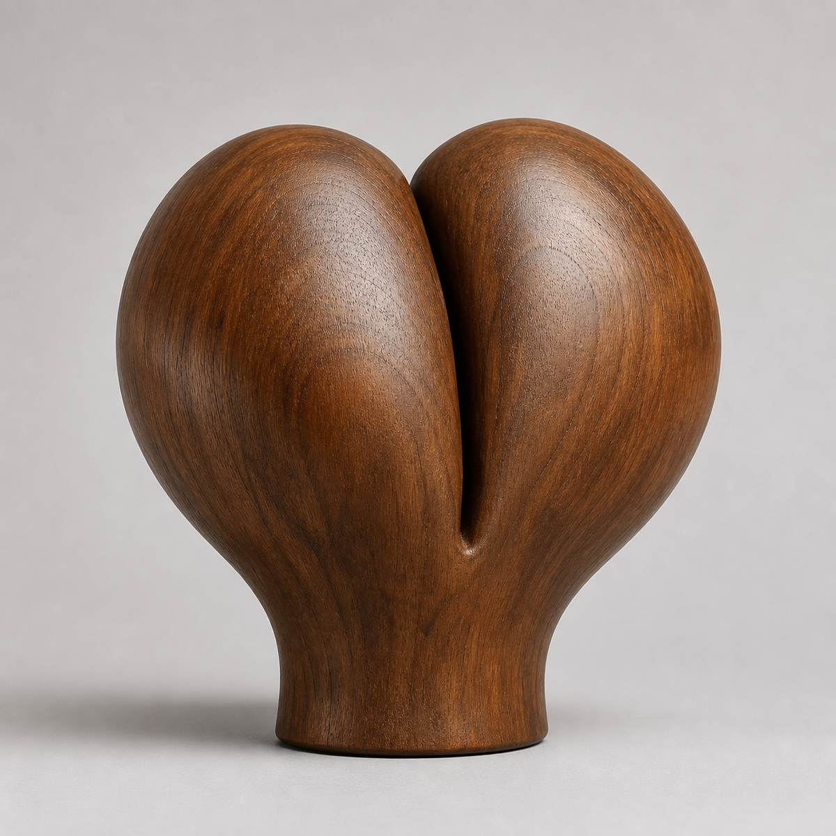 Split Bloom, abstract teak wood sculpture — three-quarter view