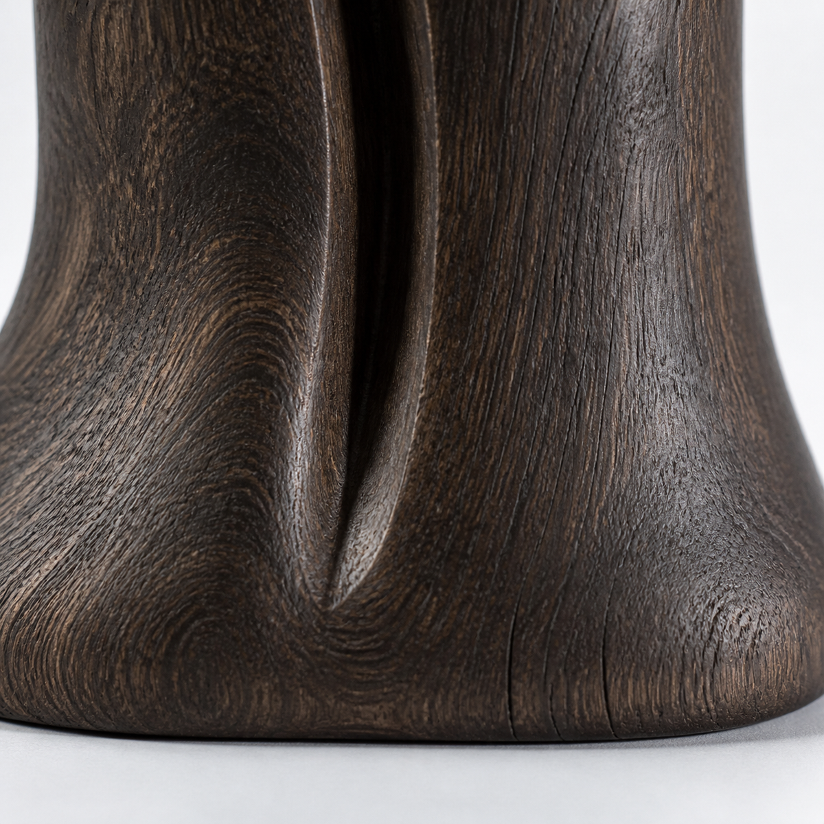 Crown Divide, teak wood floor sculpture — wood grain and carved detail