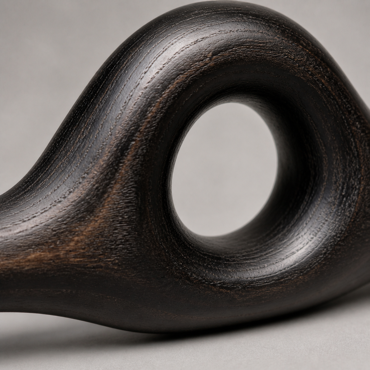 Knotted Lintel, teak wood console sculpture — wood grain and carved detail