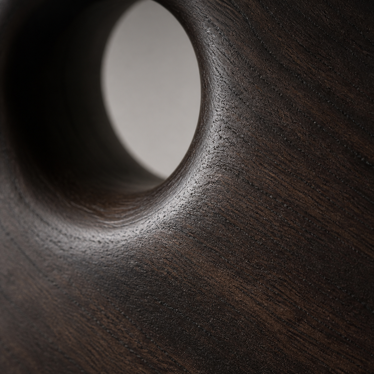 Captured Void, teak wood tabletop sculpture — wood grain and carved detail