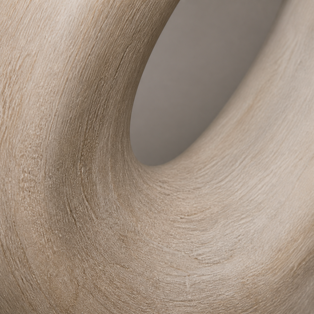 Oblique Halo, abstract teak wood sculpture — wood grain and carved detail