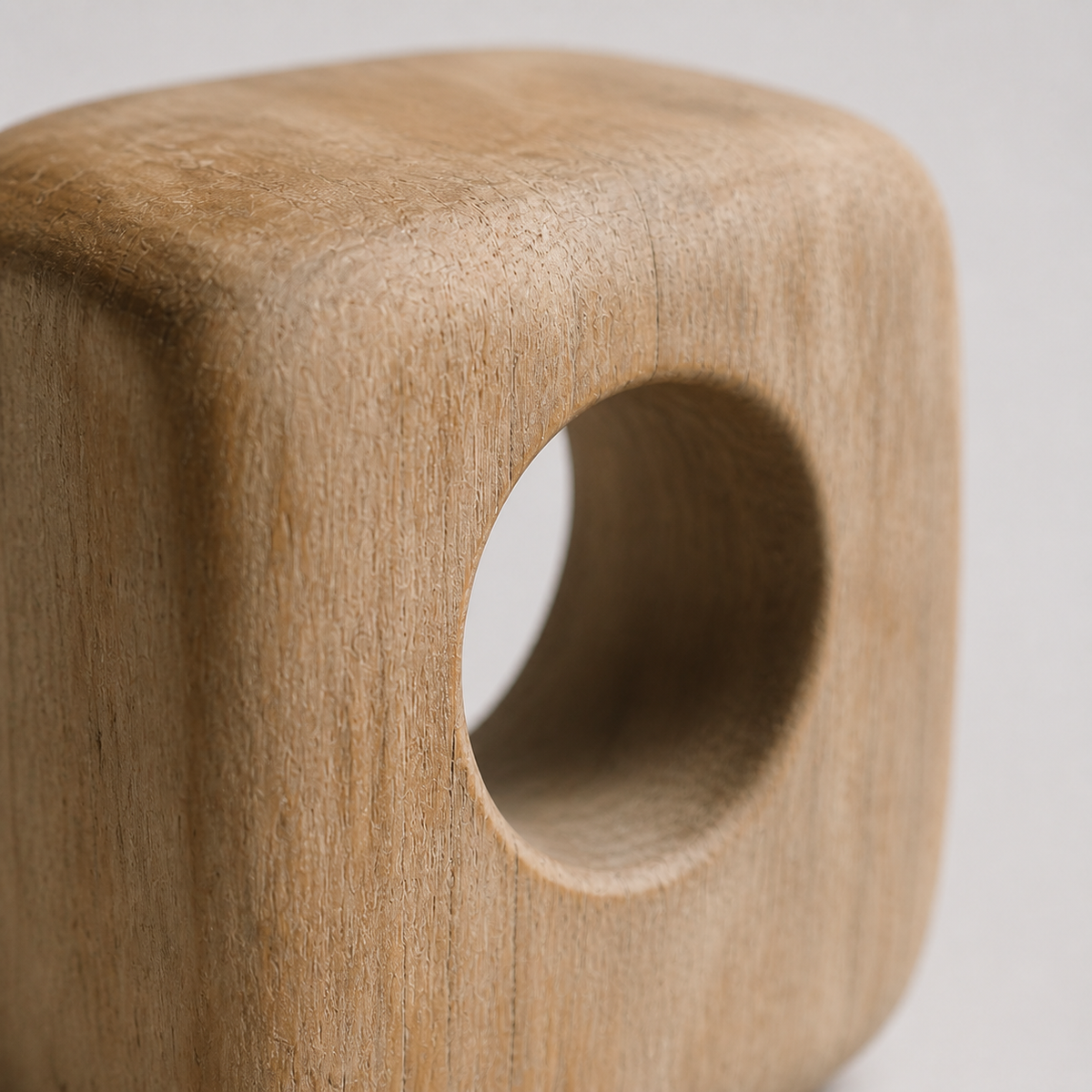 Void Cube Study, teak wood tabletop sculpture — wood grain and carved detail