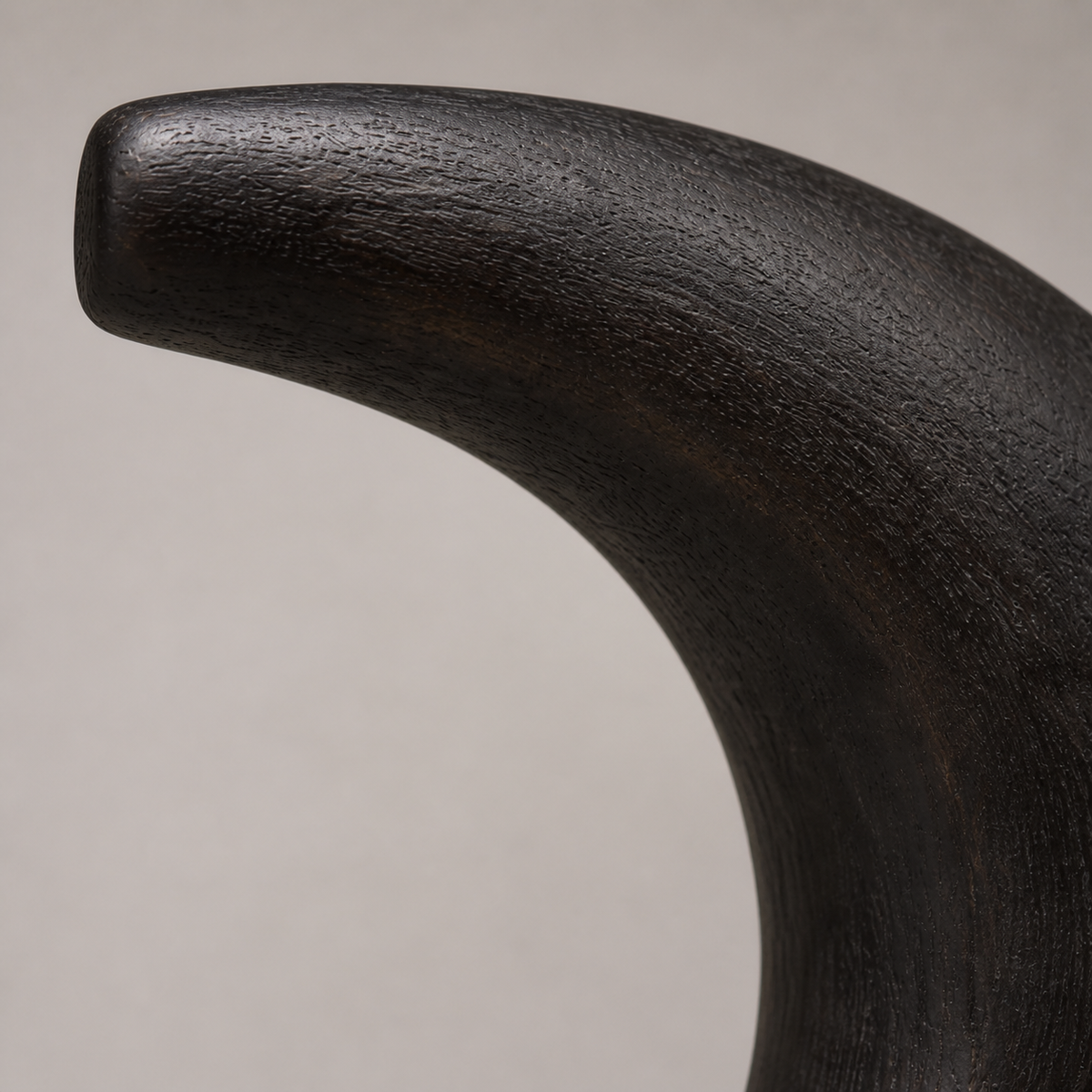 Cantilever Moon, abstract teak wood sculpture — wood grain and carved detail