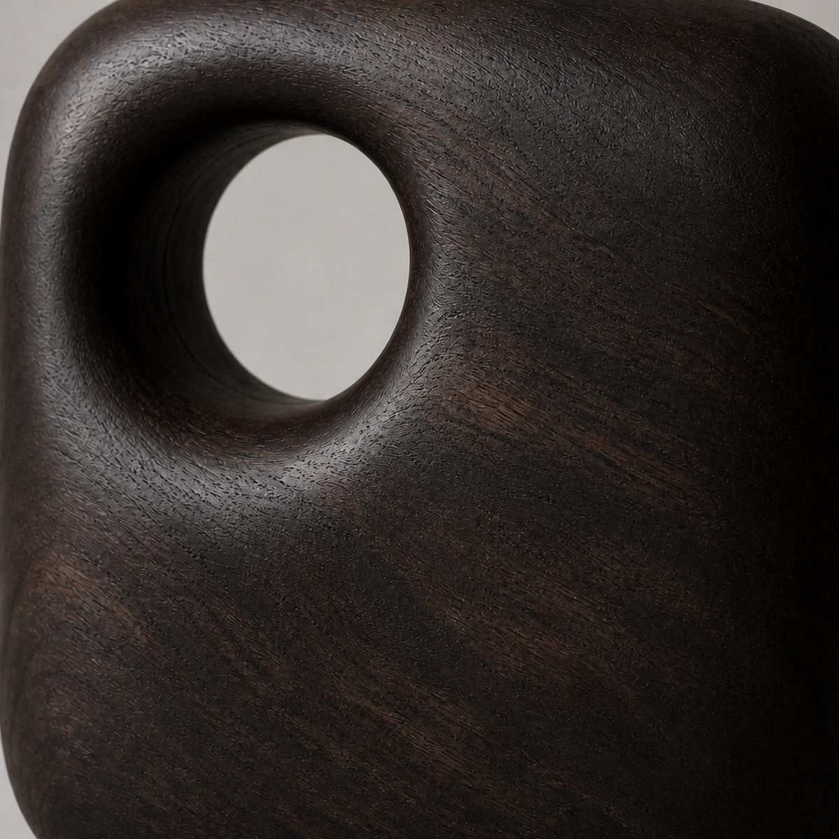 Captured Void, teak wood tabletop sculpture — wood grain and carved detail