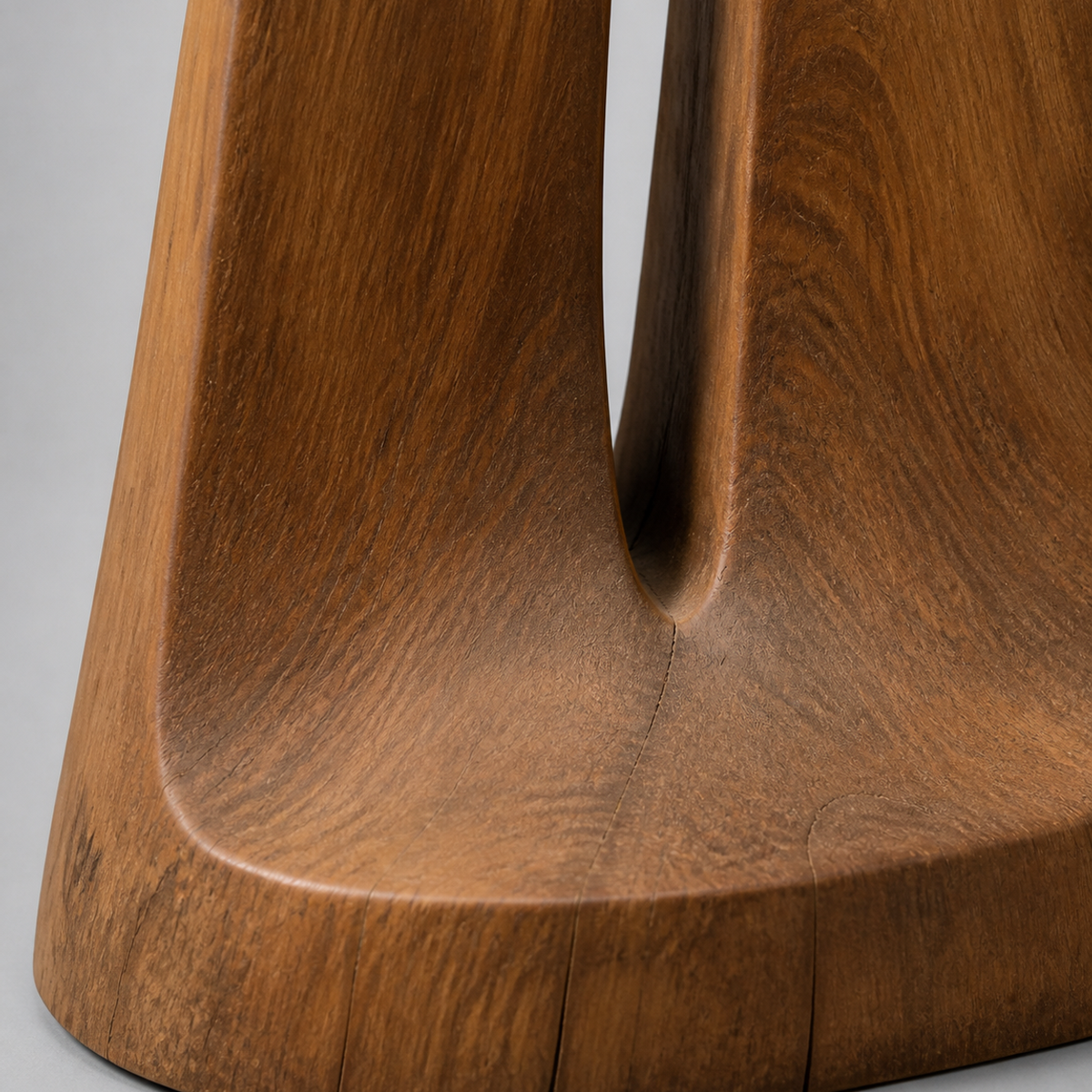 Inward Lean, teak wood floor sculpture — wood grain and carved detail