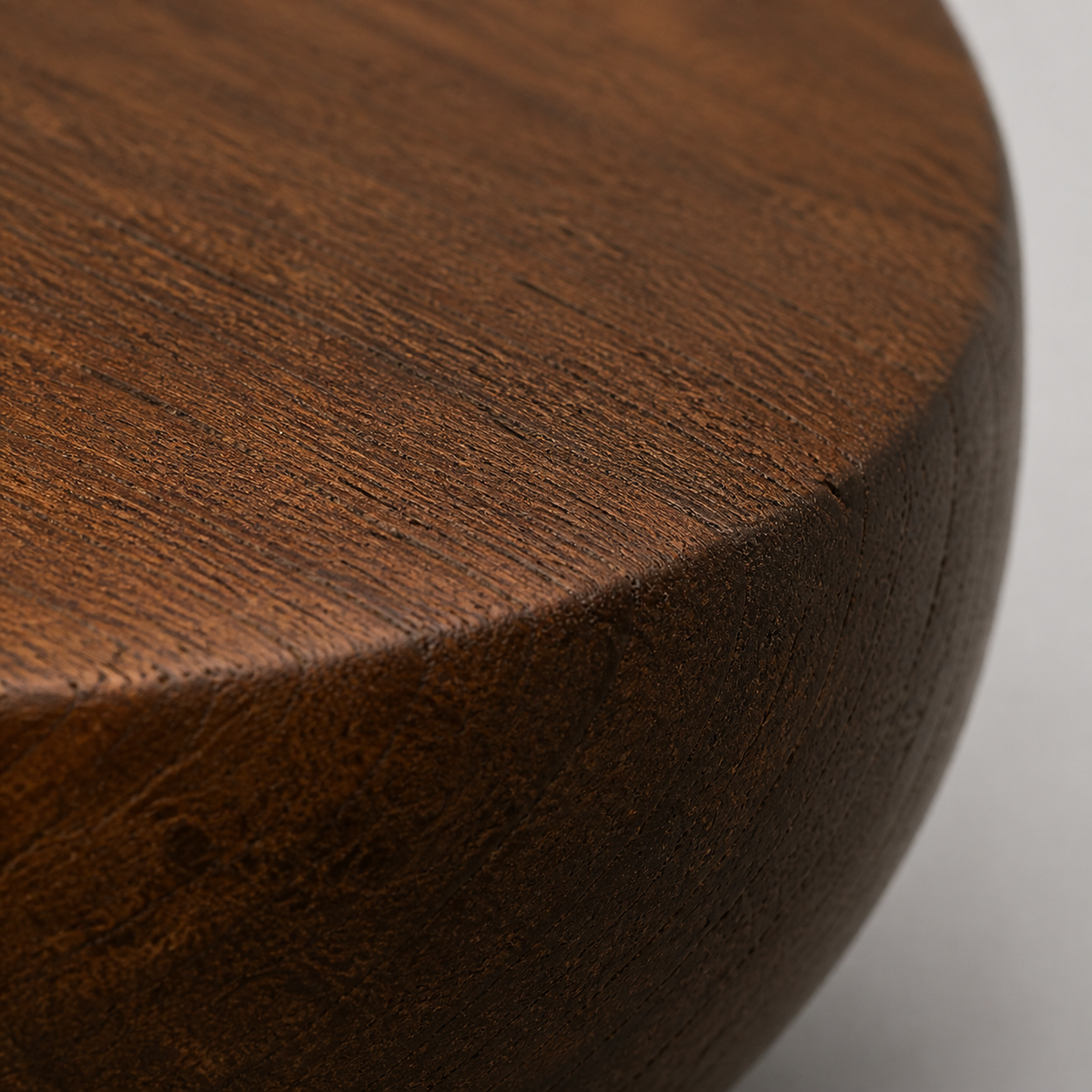 Oblique Stone, teak wood tabletop sculpture — wood grain and carved detail