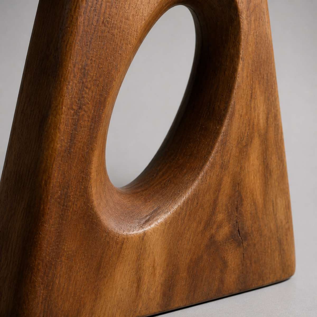 Inclined Aperture, teak wood floor sculpture — wood grain and carved detail