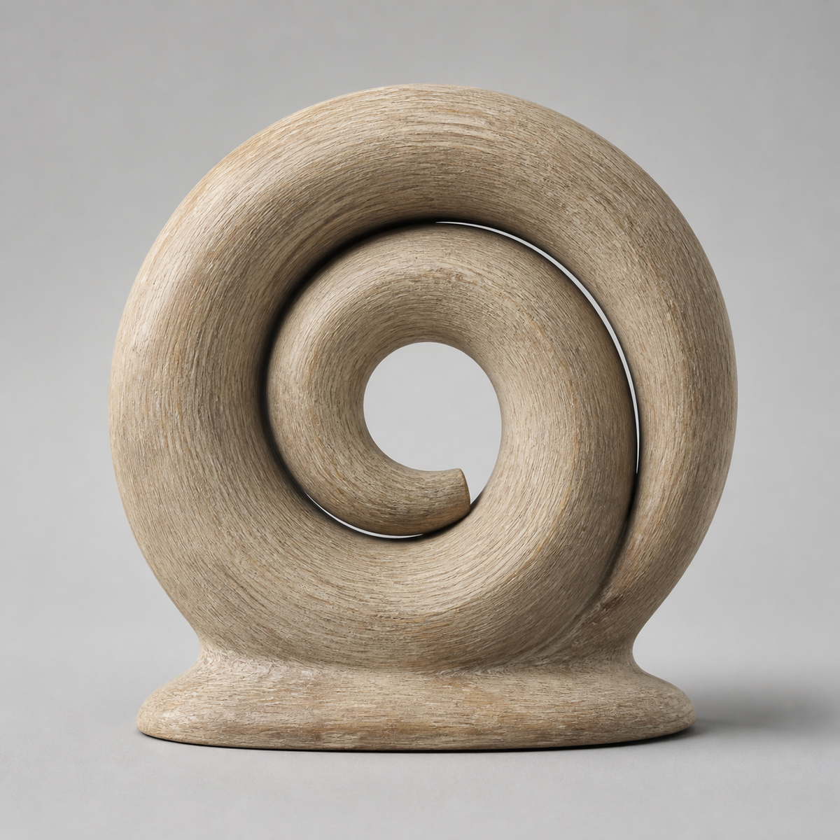 Quiet Coil, abstract teak wood sculpture — three-quarter view