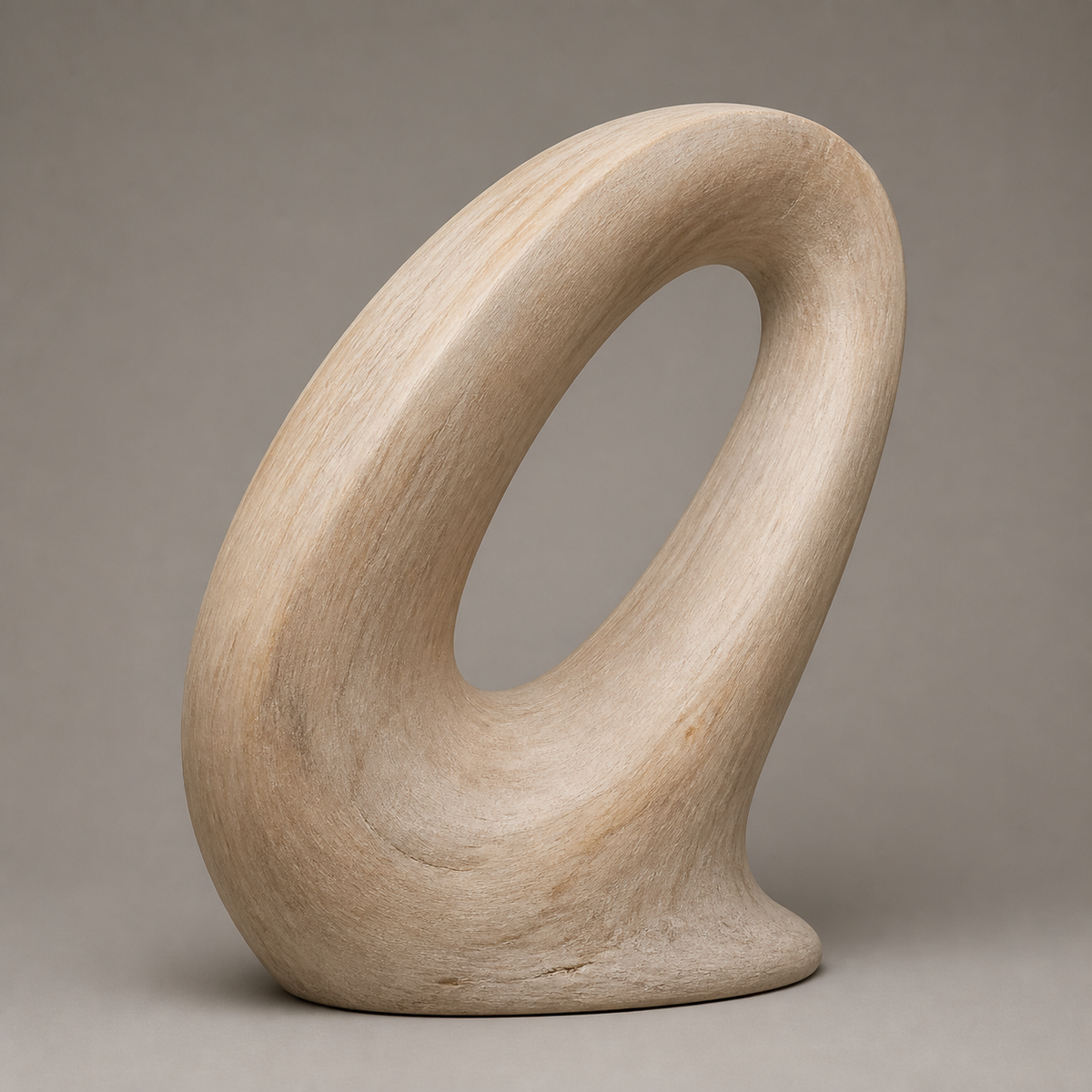 Oblique Halo, abstract teak wood sculpture — three-quarter view