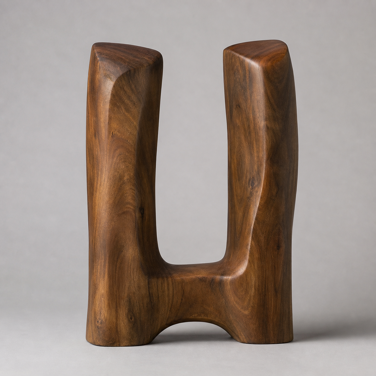 Twin Datum, teak wood floor sculpture — three-quarter view