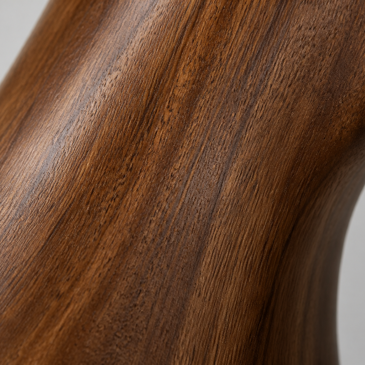 Splayed Axis, teak wood floor sculpture — wood grain and carved detail