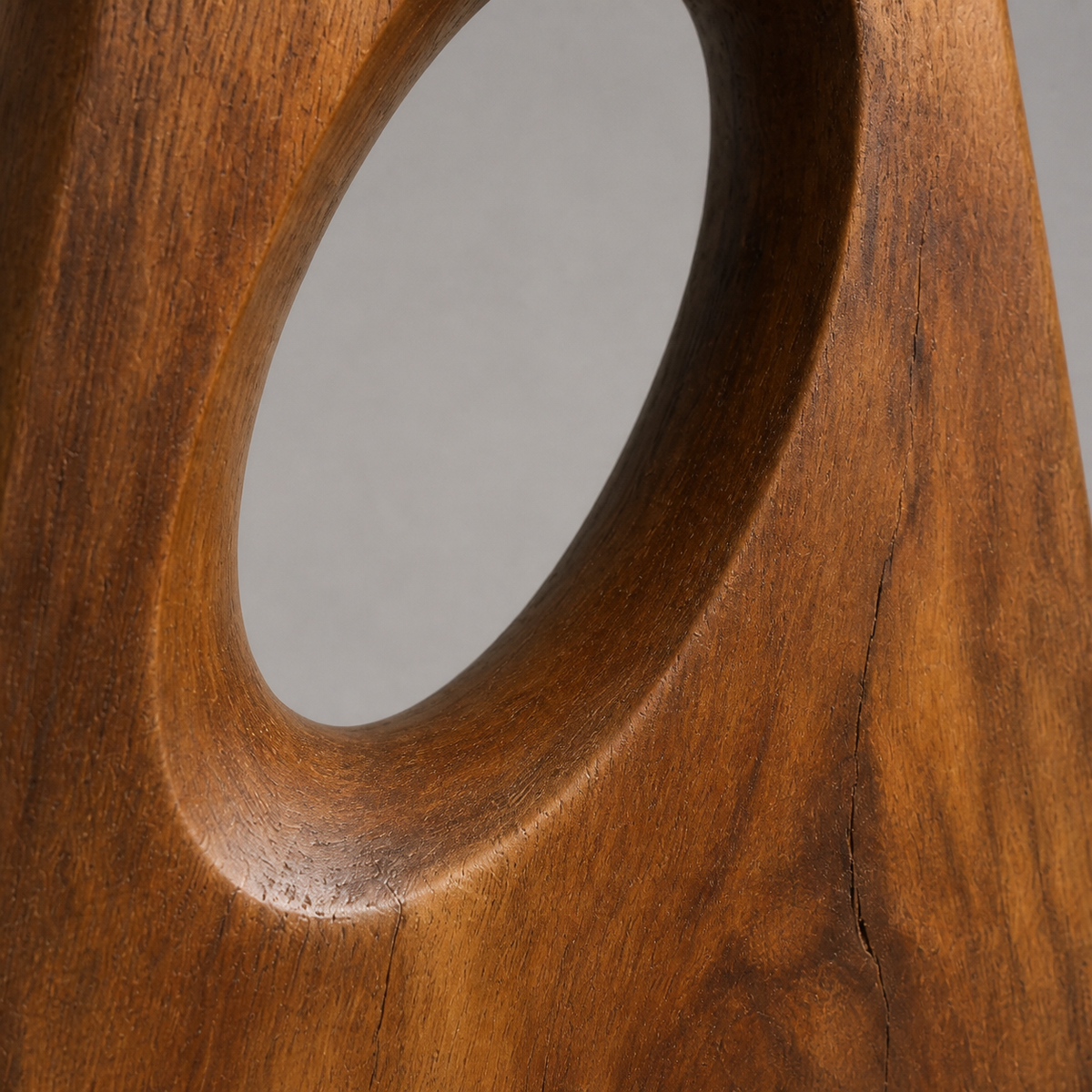 Inclined Aperture, teak wood floor sculpture — wood grain and carved detail