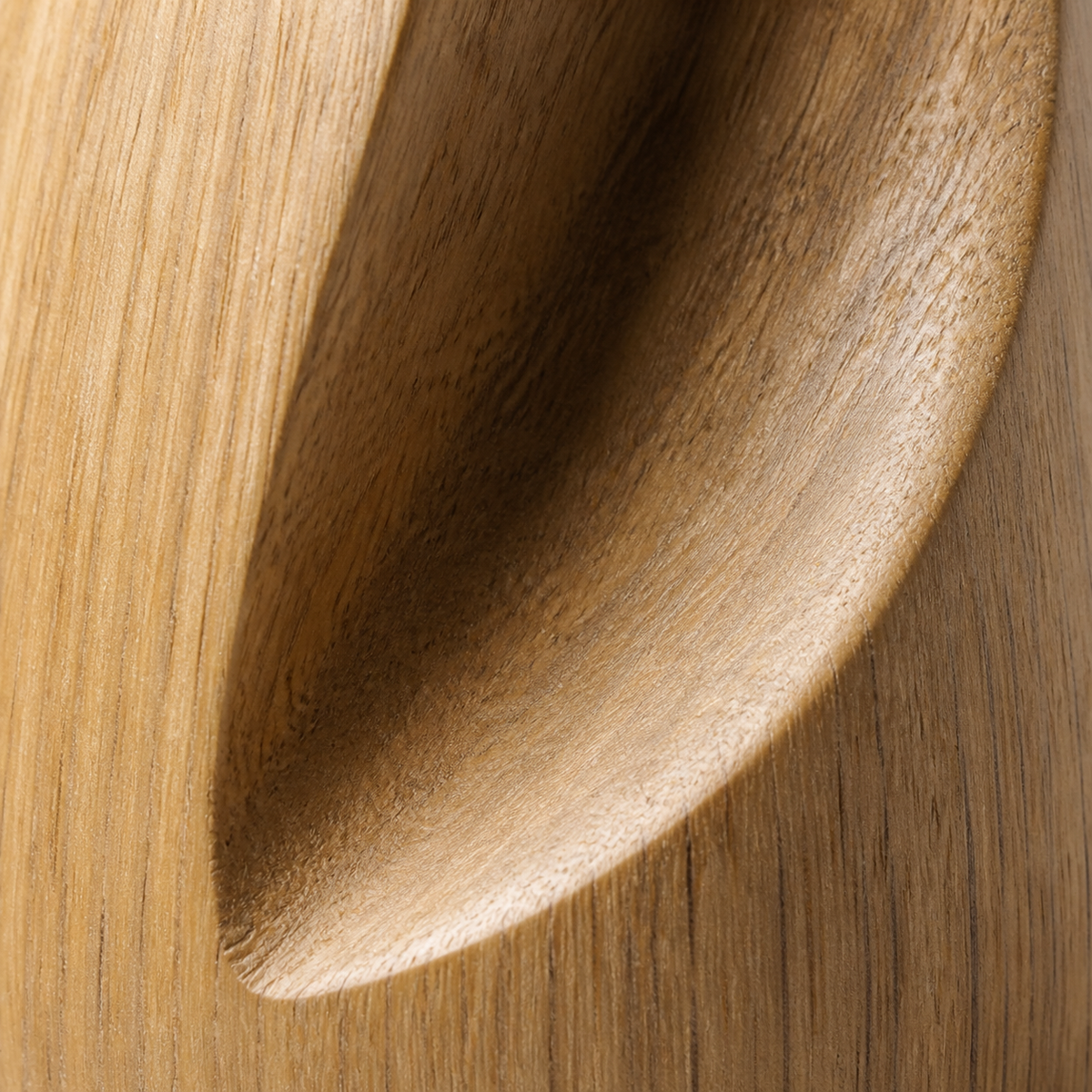 Folded Spire, teak wood floor sculpture — wood grain and carved detail