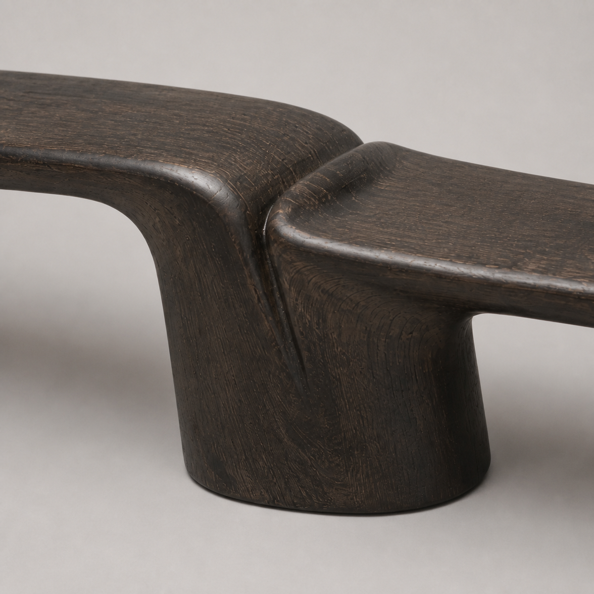 Folded Span, teak wood console sculpture — wood grain and carved detail