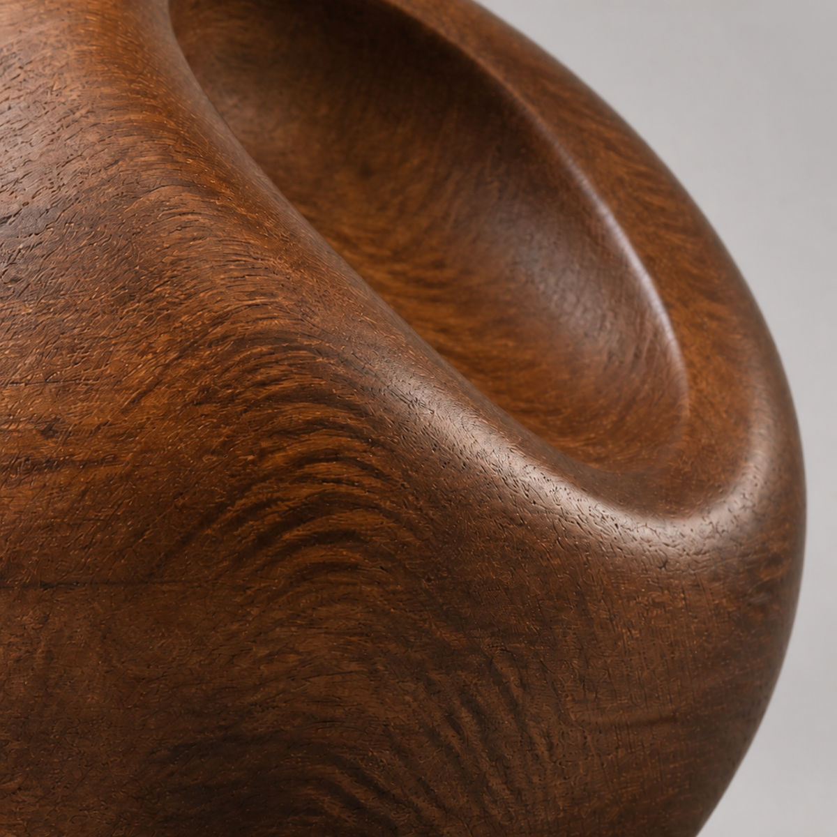 Tension Vessel, abstract teak wood sculpture — wood grain and carved detail