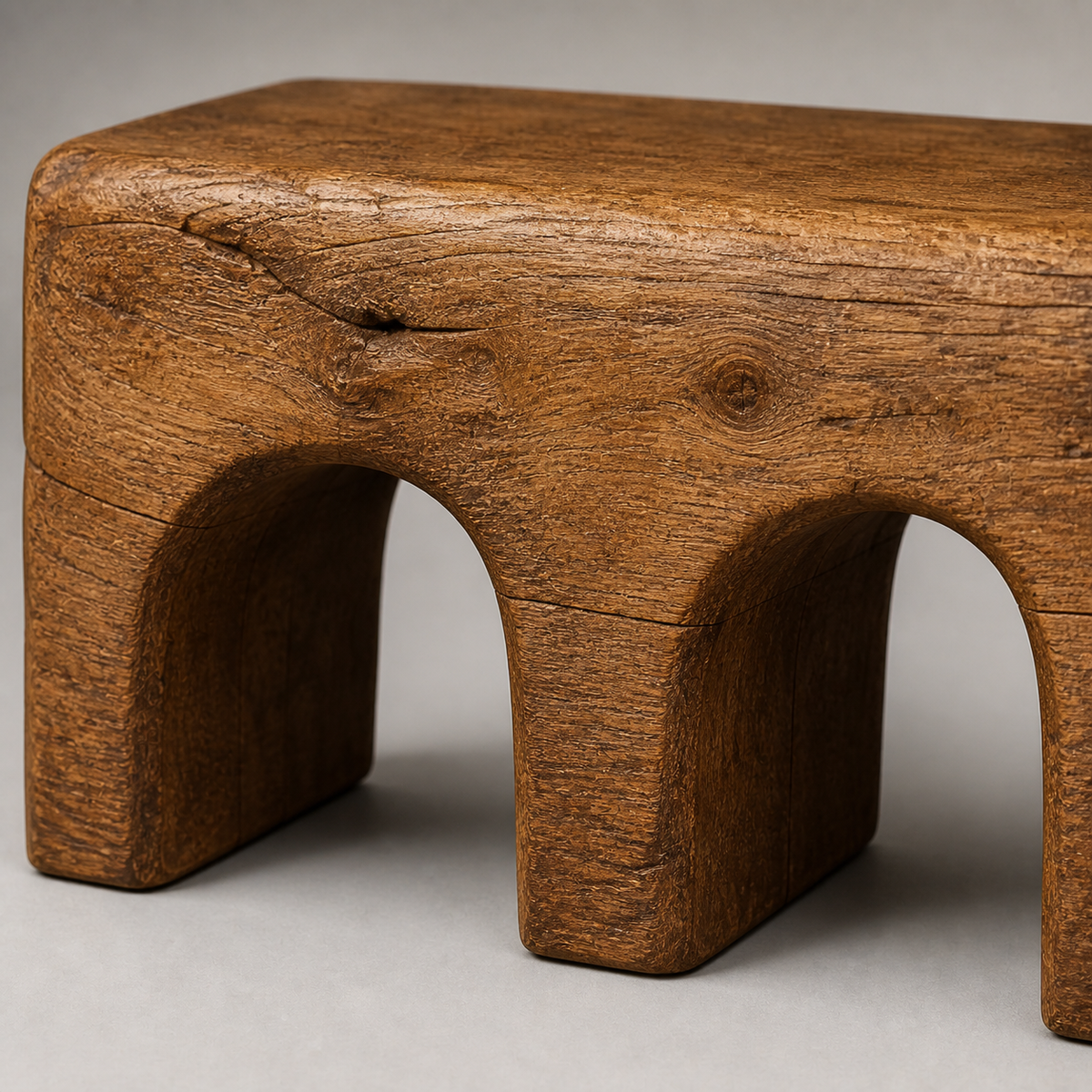 Triple Compression, teak wood console sculpture — wood grain and carved detail