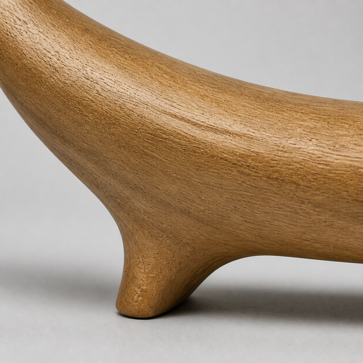 Bridged Crescent, teak wood console sculpture — wood grain and carved detail