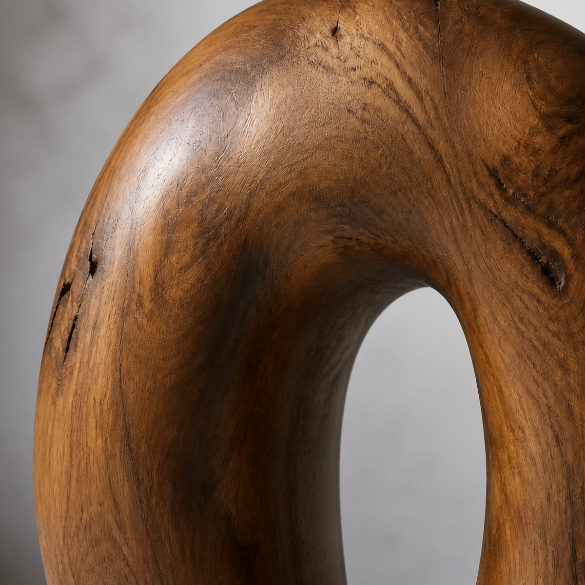 Hollow Crest, teak wood floor sculpture — wood grain and carved detail