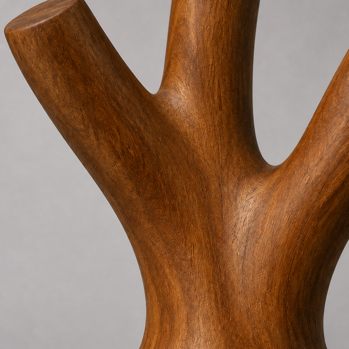 Triune Reach, teak wood floor sculpture — wood grain and carved detail