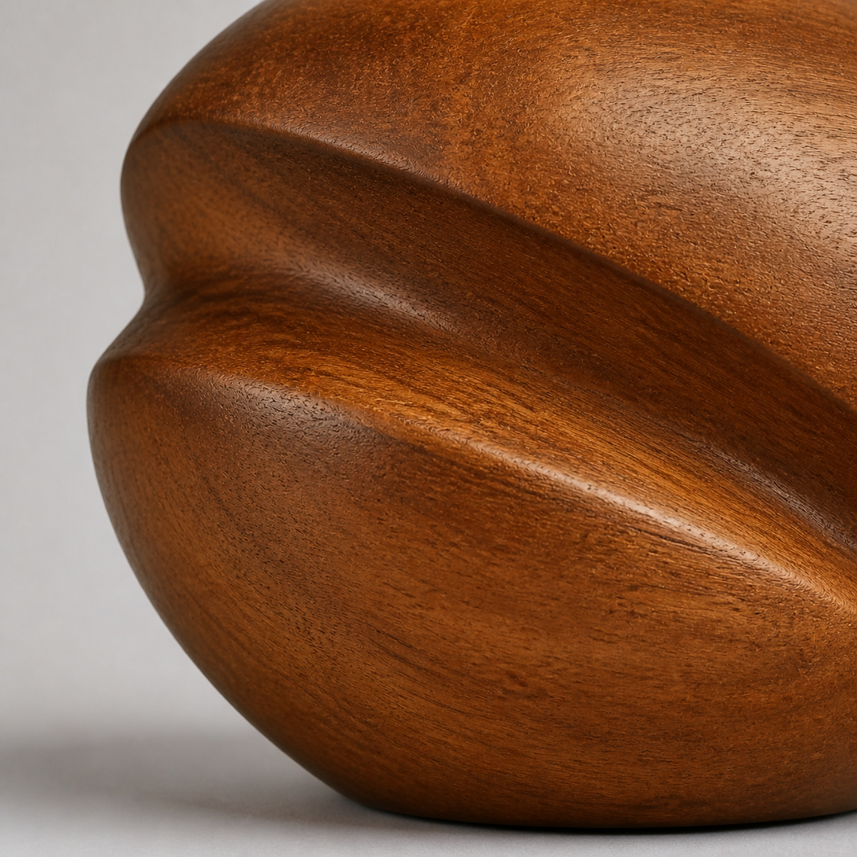 Pressed Helix, abstract teak wood sculpture — wood grain and carved detail