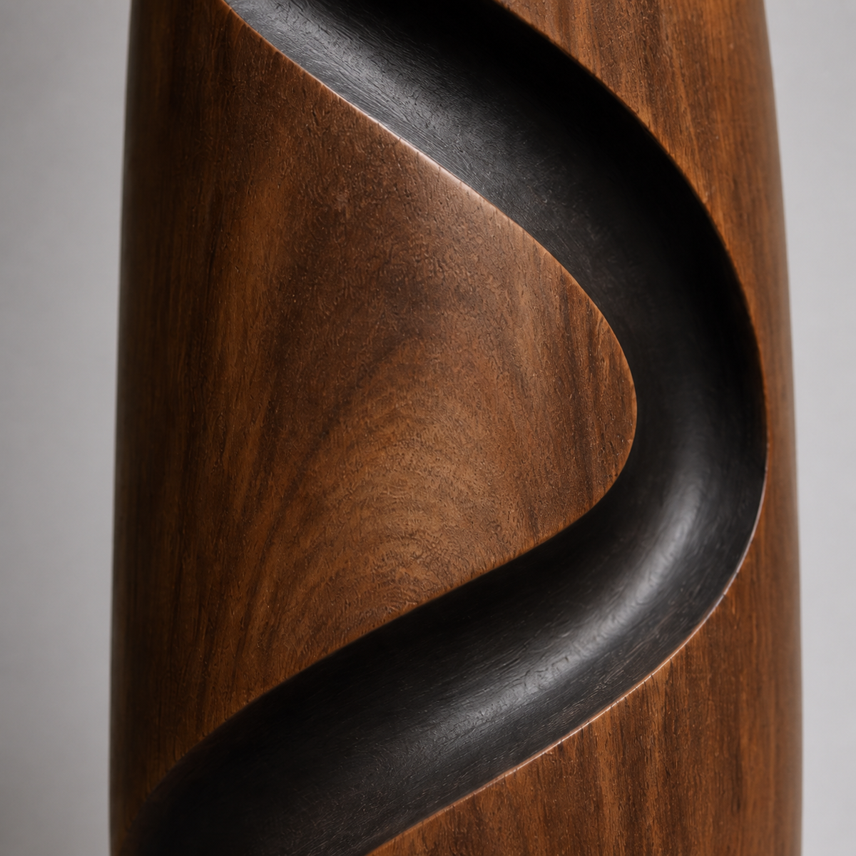 Spiral Rift Monolith, teak wood floor sculpture — wood grain and carved detail