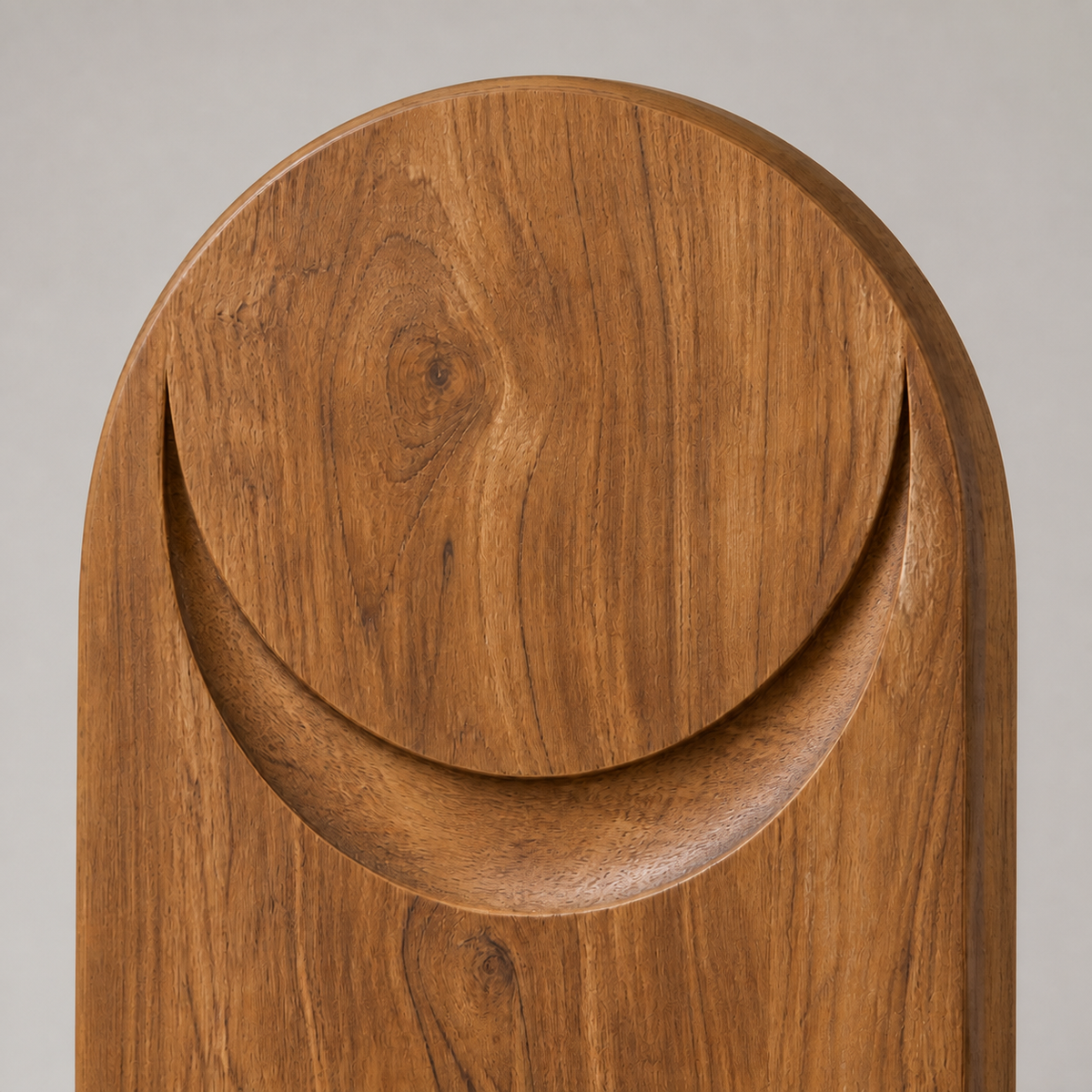 Crescent Plinth, abstract teak wood sculpture — wood grain and carved detail
