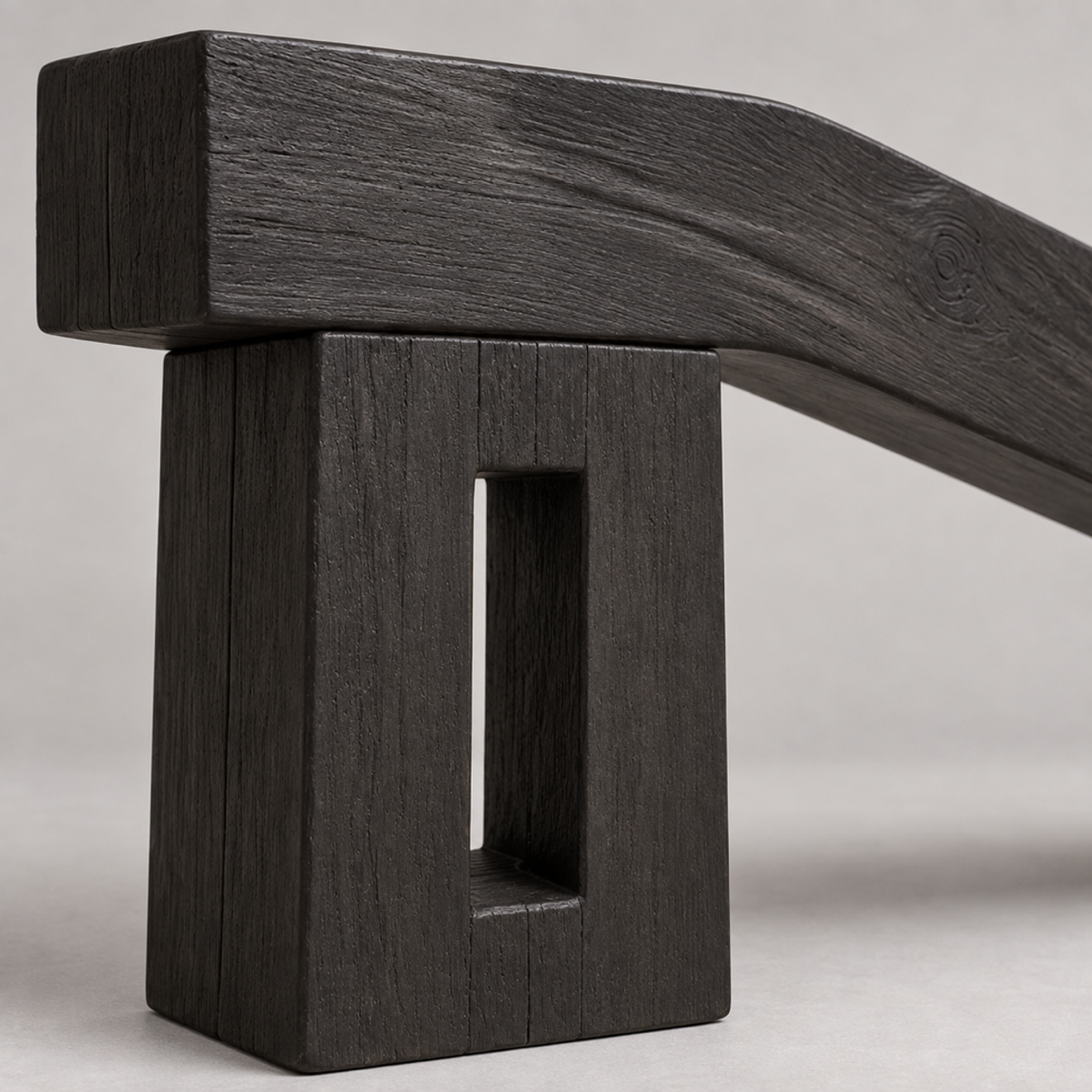 Cranked Beam, teak wood floor sculpture — wood grain and carved detail
