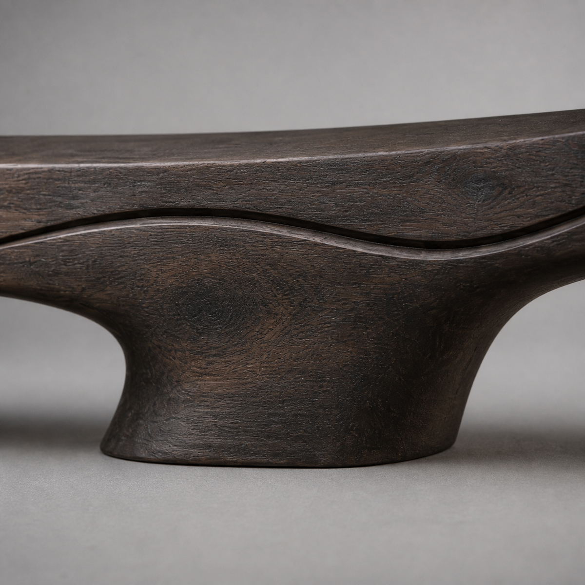 Lifted Current, teak wood console sculpture — wood grain and carved detail